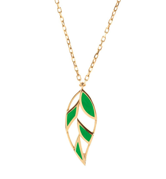 14 ayar altından yapılmış FIOLIA kolye, iki tarafında sedef ve malakit emaye bulunan 14 ayar sarı altın kolye ucu